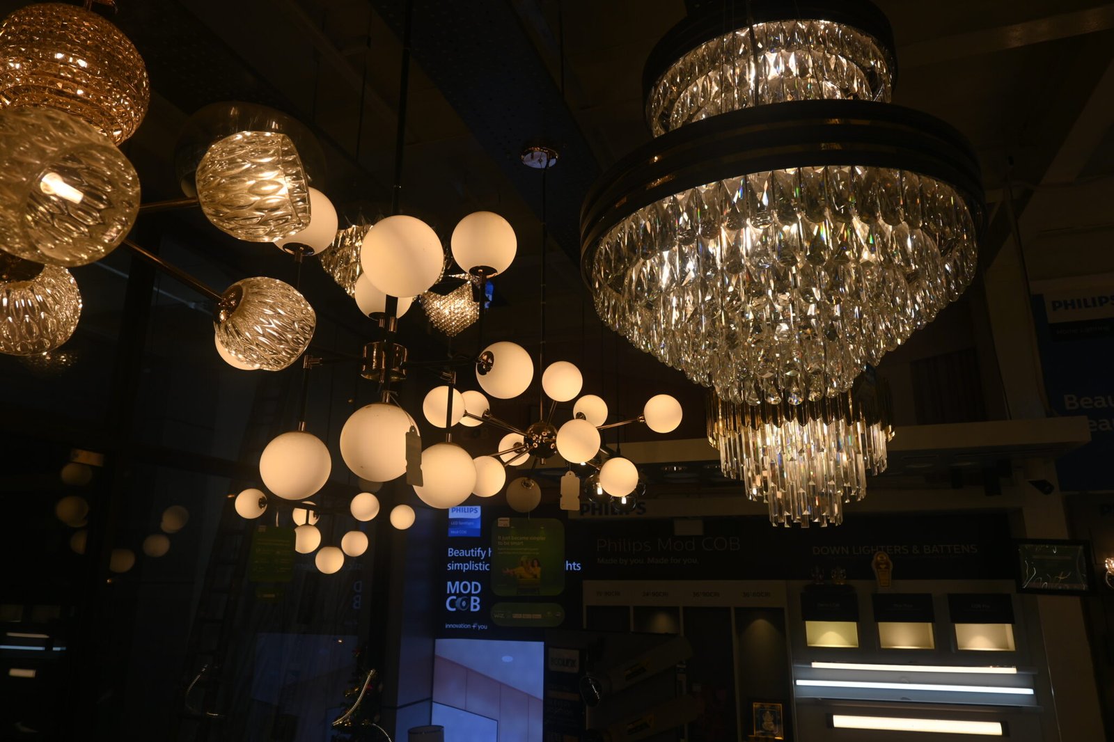 Elegant chandelier lighting display at Elite Hues showroom Katupakkam Chennai