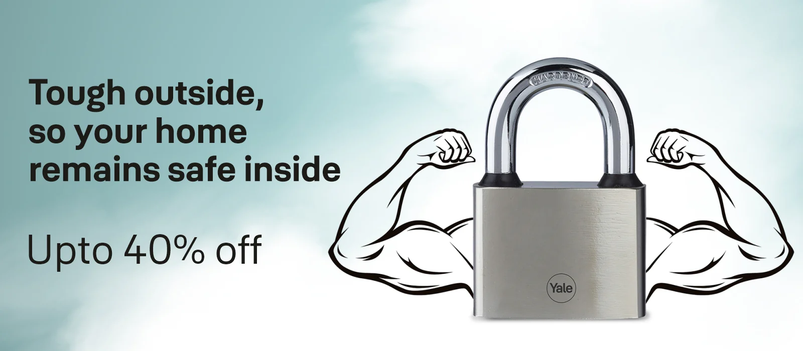 Yale steel padlock securing garden gate outdoors